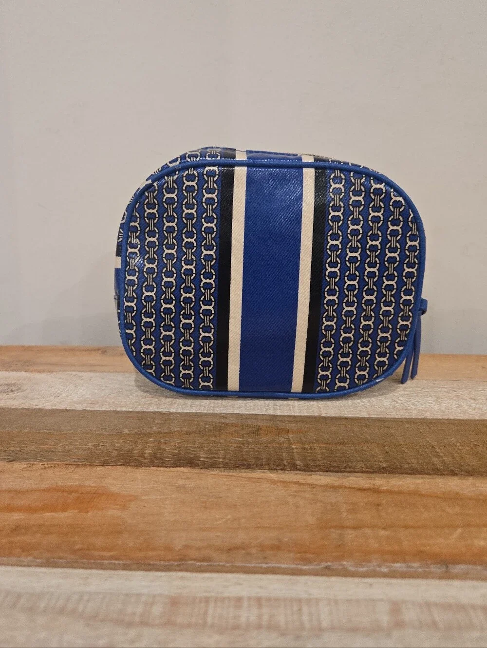 Tory Burch Gemini Link Stripe Makeup Bag With Vertical Striped Design.